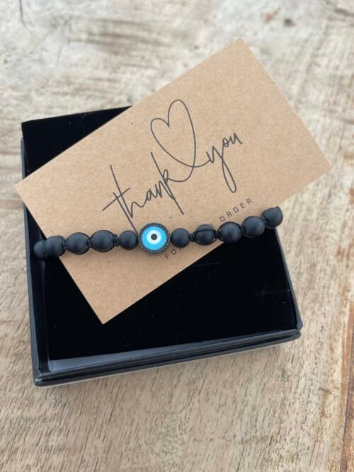 צמיד גבר חרוזים שחורים עם עין עיגול טורקיז משובצת