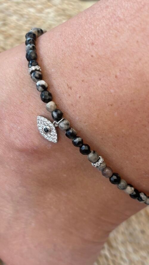 צמיד רגל חרוזים שחורים בשילוב עין