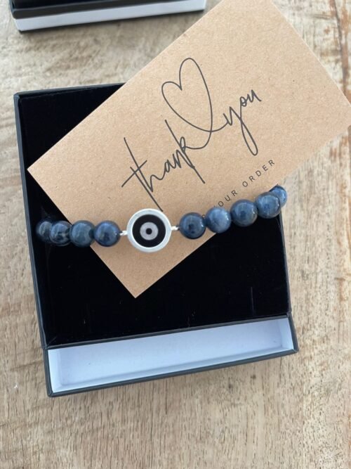 צמיד גבר חרוזים כחולים עם עין עיגול שחורה